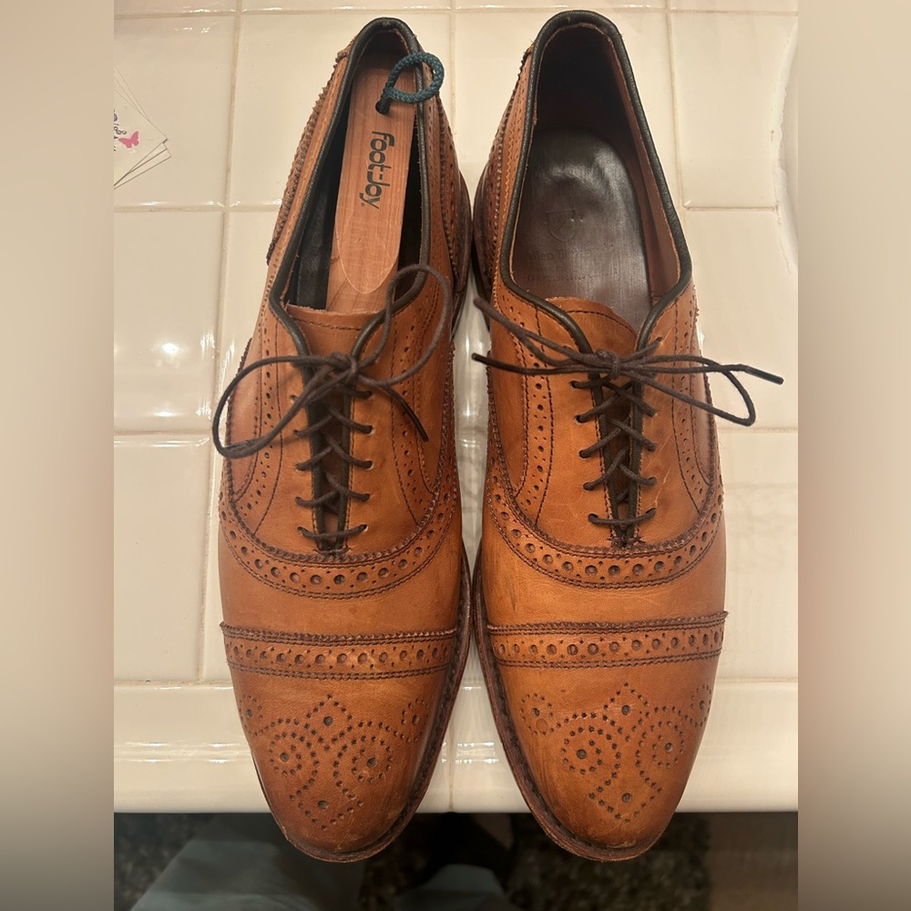 Tan Allen Edmonds dress shoe.